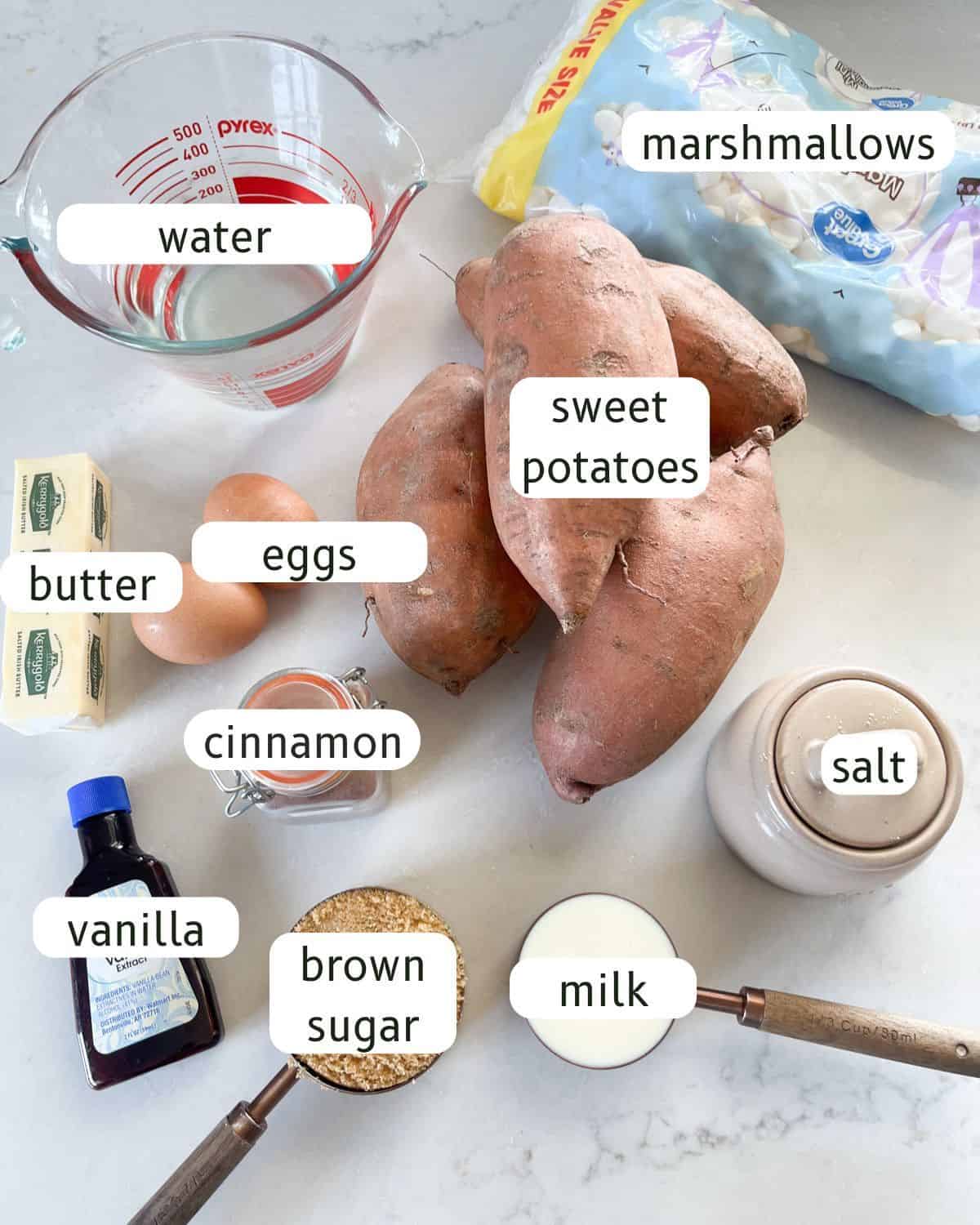 Dutch oven sweet potato casserole ingredients labeled on a countertop.