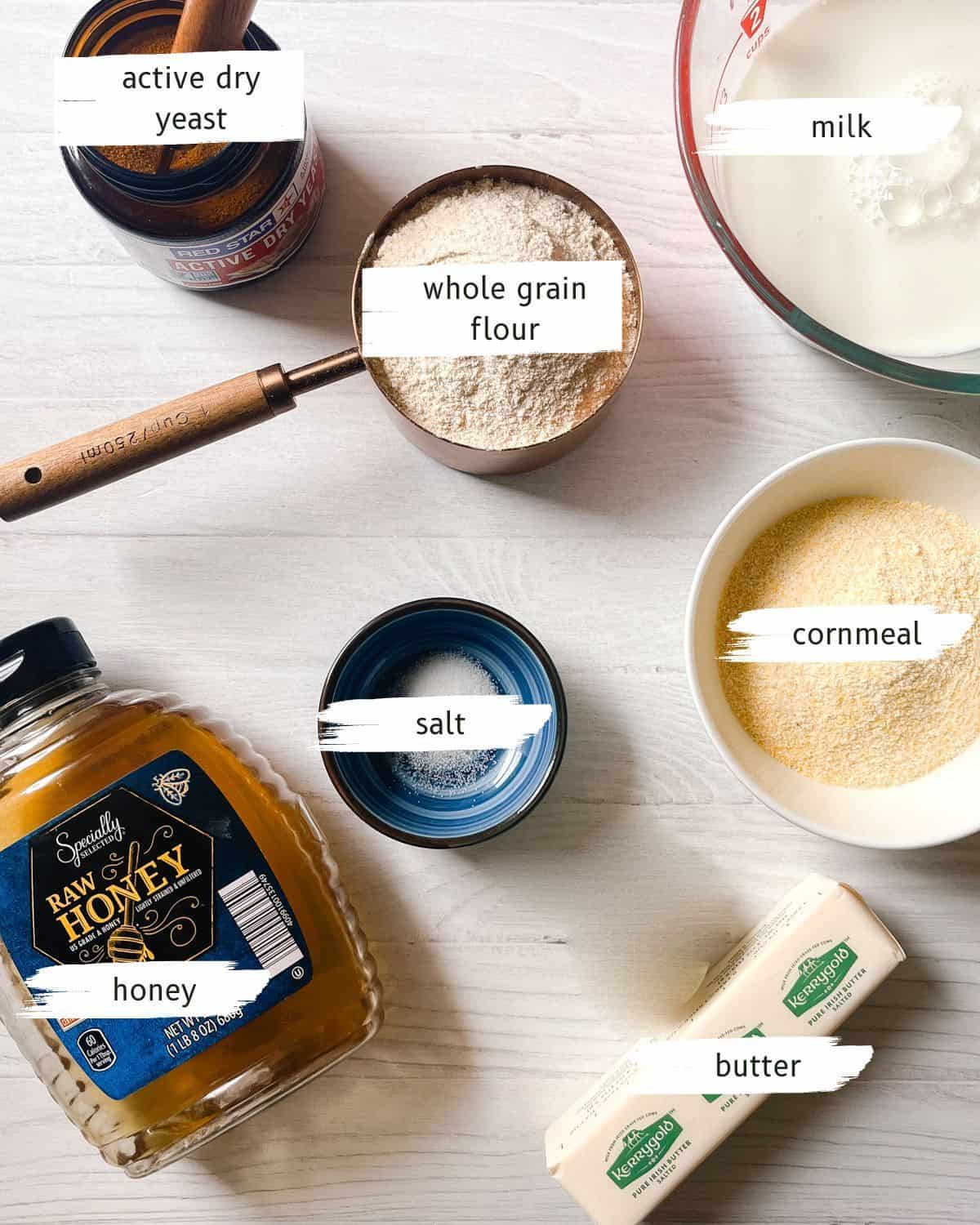 Whole grain English muffin ingredients assembled on a counter.