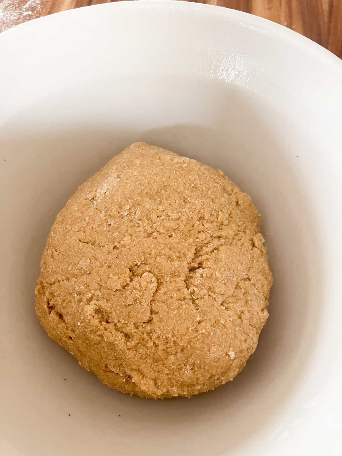 Maple bar dough ball in a bowl.