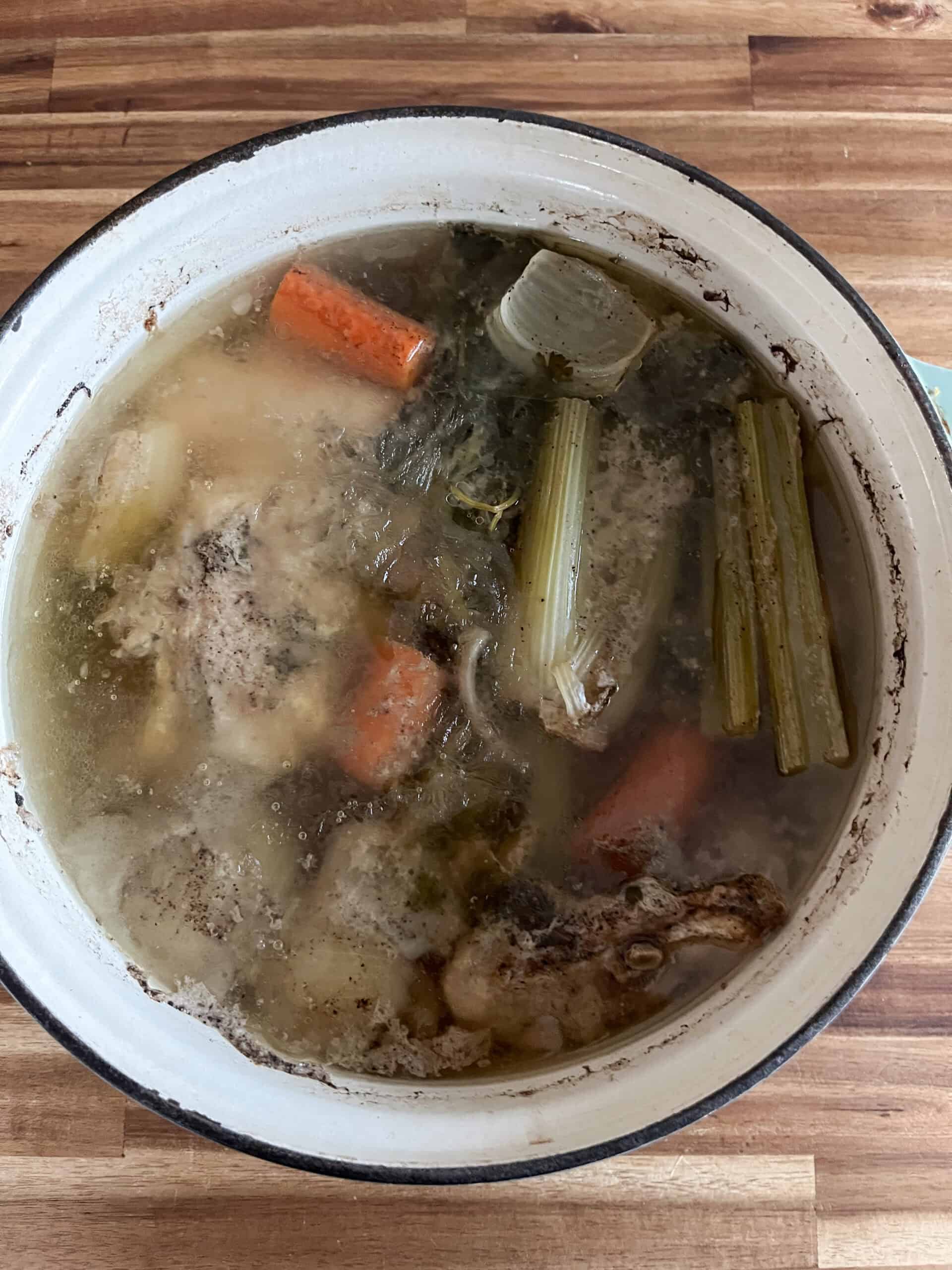 Chicken broth ingredients after being simmered for 3 hours.